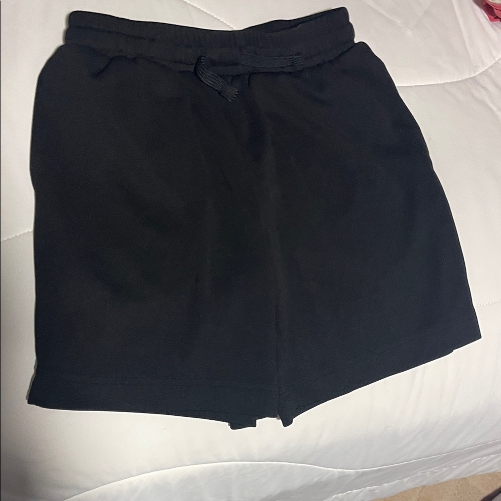 4 Pairs bits size 8 shirts. All have adjustable waist bands or drawstrings.